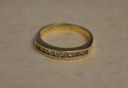 18ct gold half eternity ring with 9 smal