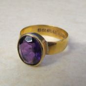 22ct gold band with 9ct amethyst top, am