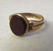 Gents 9ct gold ring with burgundy stone