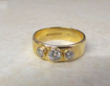 18ct gold 3 stone diamond ring, centre s