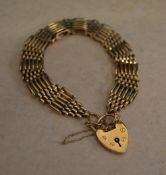 9ct gold gate bracelet with padlock, app