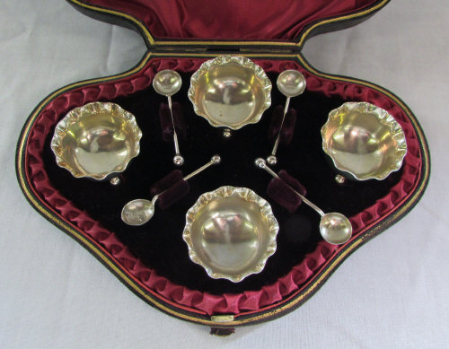 Cased silver open salts with spoons (inc