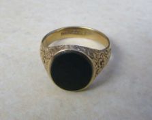 Gents 9ct gold ring with green stone wei