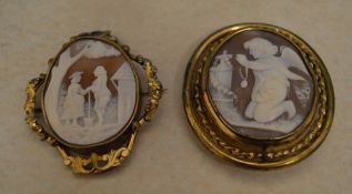 2 yellow metal cameo style brooches