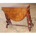 A burr walnut Sutherland dining table, on twin turned end supports, 36" x 8" closed