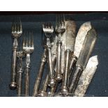 A set of six pairs of plated fish knives and forks, blades engraved foliage