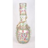 A 19th Century Cantonese famille verte sprinkler vase decorated with panels of figures, birds and