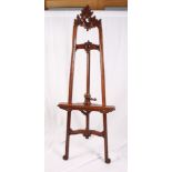 A Rococo design carved wooden easel