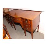 A 19th Century mahogany sideboard with bowed centre section, fitted one drawer, flanked by drawers