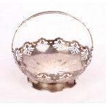 A silver basket with pierced decoration and swing handle, 10.1oz troy approx