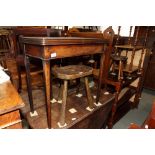 A mahogany rectangular fold-over top tea table with plain frieze, on square taper supports, 29"