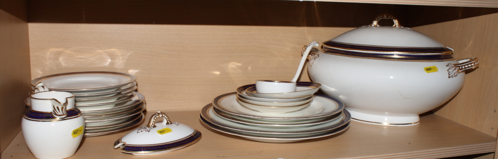 A Copeland Spode oval two-handled soup tureen and cover with blue and gilt key pattern border,