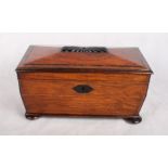 An early 19th Century rosewood two-compartment tea caddy with glass mixing bowl, on bun feet, 12"