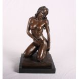 John Koch: a bronze statue of a kneeling nude female, on granite base, 12" high