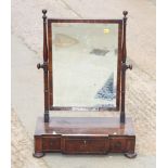 A 19th Century mahogany swing toilet mirror, bamboo turned standards, on breakfront base fitted