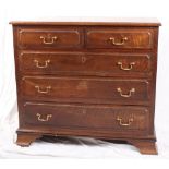 A Georgian design chest of two short and three long drawers, on bracket supports, 37" wide