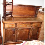 A late 19th Century mahogany chiffonier with panelled ledge back, base fitted three drawers and