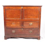 An 18th Century mule chest with panelled front, fitted two short and one long drawer below, 38"