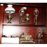 A number of mainly 19th Century horse brasses, letter scales, a copper spirit kettle and other items