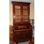 A 19th Century mahogany bureau bookcase, the upper section fitted adjustable shelves enclosed two