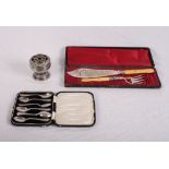 A cased set of six silver teaspoons, a cased pair of plated fish servers with ivory handles and a