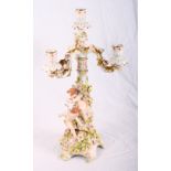 A 19th Century Sitzendorf porcelain four-light candelabrum on floral encrusted base with two