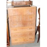 A Heal's style oak chest of six drawers with panelled sides, 27" wide