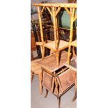 A bamboo framed rectangular occasional table with hinged side shelves and a similar table with