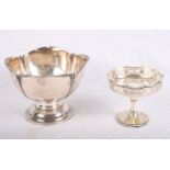 A silver pedestal dish with lobed rim and a smaller similar with pierced rim, 9.5oz troy approx