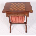 An early 19th Century mahogany rectangular games/work table, top inlaid chessboard, fitted frieze