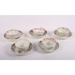 A collection of late 18th Century tea bowls and saucers