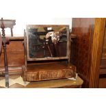 A 19th Century mahogany framed toilet mirror on bowfront base fitted three drawers, 21" wide