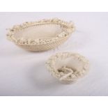 A 19th Century Belleek oval openwork basket with floral encrusted border and a similar smaller