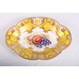 A Royal Worcester oval cabinet dish decorated yellow, pink and gilt border, centre painted fruit,