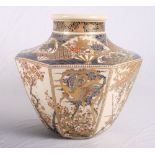 An early 20th Century octagonal squat baluster Satsuma vase, sides decorated panels of birds amongst