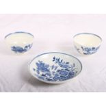 A pair of 18th Century Worcester porcelain fence pattern tea bowls and a saucer