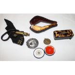 A papier-mache and tortoiseshell snuff box, a cased meerschaum pipe, a military issue brass