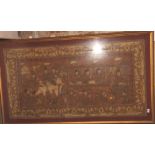 A Thai glazed fabric panel embroidered in metal threads with procession of figures and an