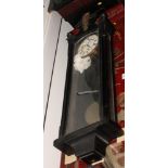 A 19th Century "Vienna" wall clock in glazed ebonised case, 42" high