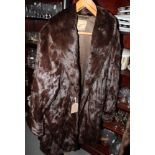 A coney three-quarter length fur coat