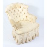 A Victorian tub armchair, button upholstered in a gold damask