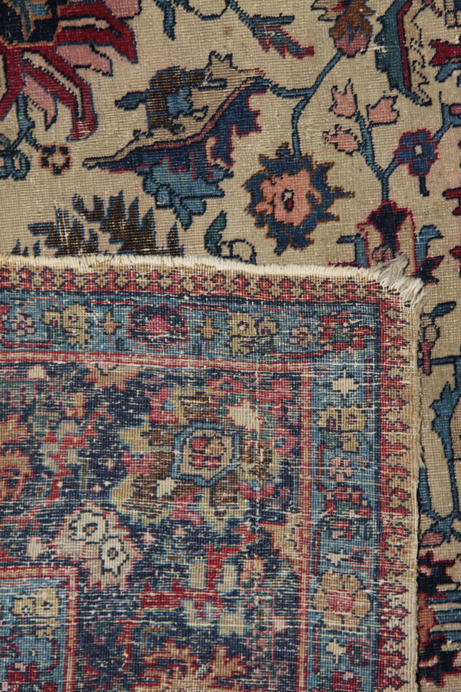 An antique Caucasian rug decorated all-over stylised floral design with three script medallions on a - Image 3 of 3