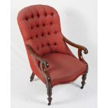 A Victorian mahogany showframe serpentine seat scroll armchair, button upholstered in a red