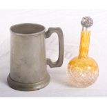 An amber cut glass scent bottle with silver cap, a plated egg boiler and a pewter presentation