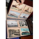 A collection of postcards in an album, ocean liners and shipping including RMS Titanic, Olympic,