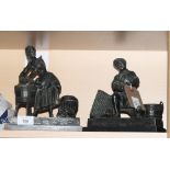 A pair of late Victorian spelter figures of a washer woman and a cobbler, on ebonised rectangular