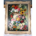 An oil on canvas, still life flowers and urn, 37" x 28", in ornate gilt frame