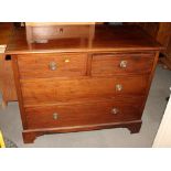 A late Georgian mahogany chest of two short and two long drawers, on bracket supports, 36" wide