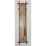 An Admiral Fitzroy barometer in glazed oak case, 41" high (insufficient mercury)