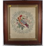A pair of Victorian gros point tapestry panels of flowers and a parrot, 14" x 17", in broad oak